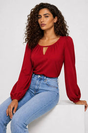 Vera - Blusa abotonada con manga abullonada - Calanoa